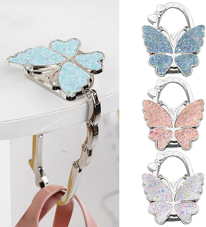 🦋Foldable Purse Hook for Table - Portable Bag Holder,Folding Handbag Hanger Various Heavy Items Desk Hook