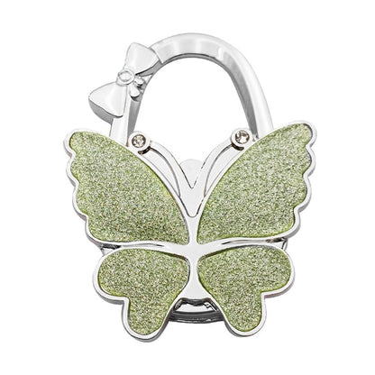 🦋Foldable Purse Hook for Table - Portable Bag Holder,Folding Handbag Hanger Various Heavy Items Desk Hook