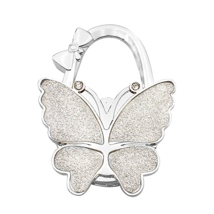 🦋Foldable Purse Hook for Table - Portable Bag Holder,Folding Handbag Hanger Various Heavy Items Desk Hook
