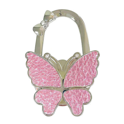🦋Foldable Purse Hook for Table - Portable Bag Holder,Folding Handbag Hanger Various Heavy Items Desk Hook