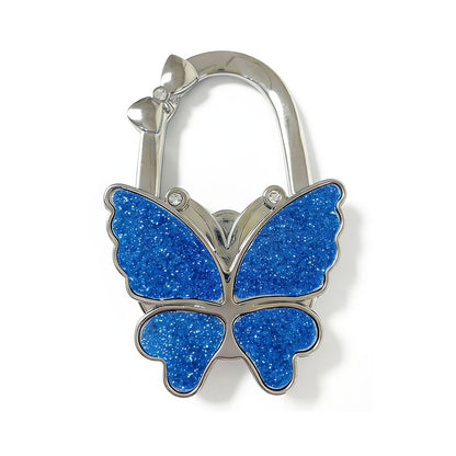 🦋Foldable Purse Hook for Table - Portable Bag Holder,Folding Handbag Hanger Various Heavy Items Desk Hook