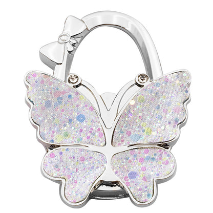 🦋Foldable Purse Hook for Table - Portable Bag Holder,Folding Handbag Hanger Various Heavy Items Desk Hook