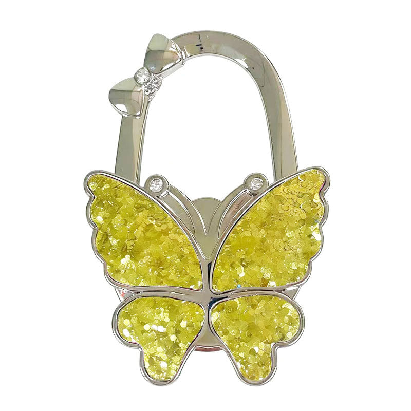 🦋Foldable Purse Hook for Table - Portable Bag Holder,Folding Handbag Hanger Various Heavy Items Desk Hook