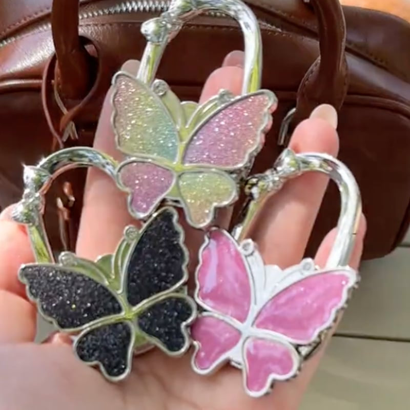 🦋Foldable Purse Hook for Table - Portable Bag Holder,Folding Handbag Hanger Various Heavy Items Desk Hook