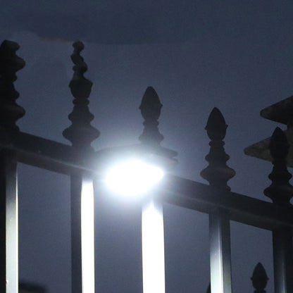Outdoor solar-powered light with clip and motion sensor