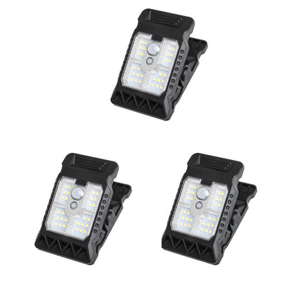 Outdoor solar-powered light with clip and motion sensor
