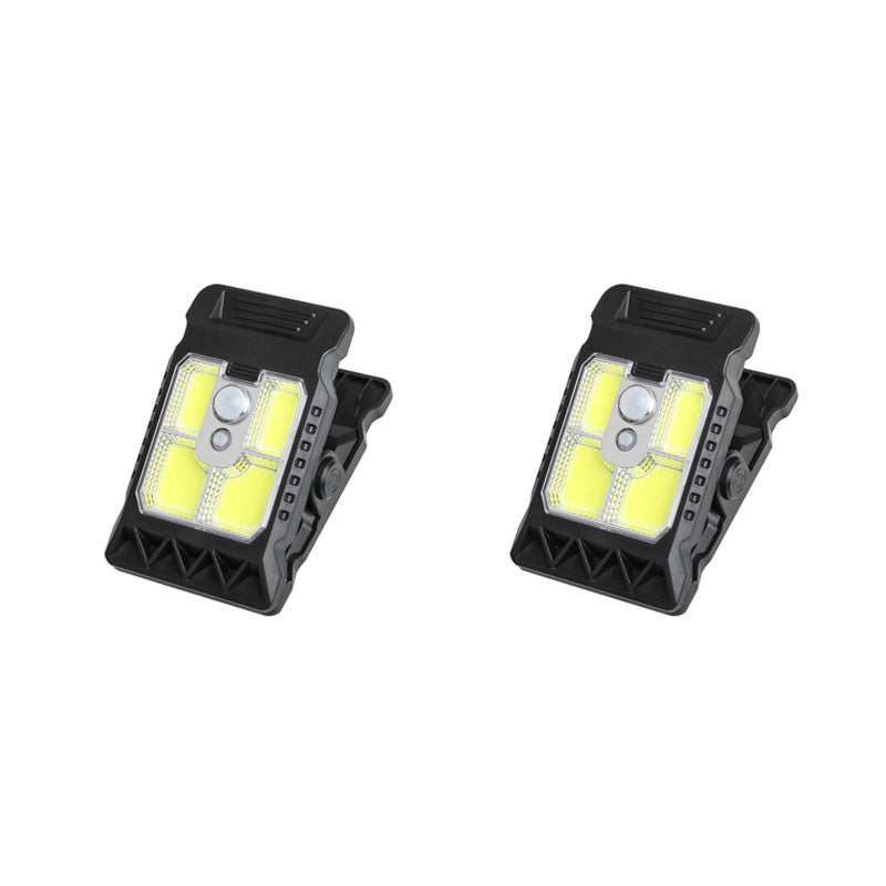 Outdoor solar-powered light with clip and motion sensor