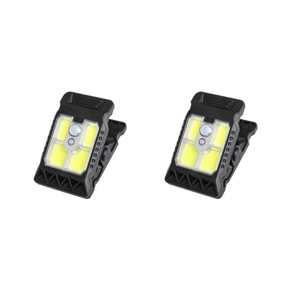 Outdoor solar-powered light with clip and motion sensor