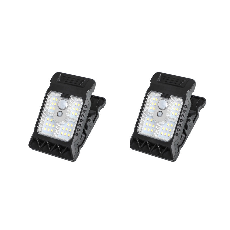 Outdoor solar-powered light with clip and motion sensor